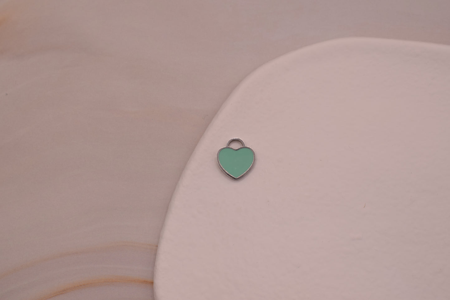 Small green and silver heart
