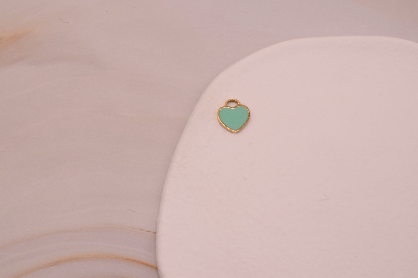 Small green and gold heart Gold